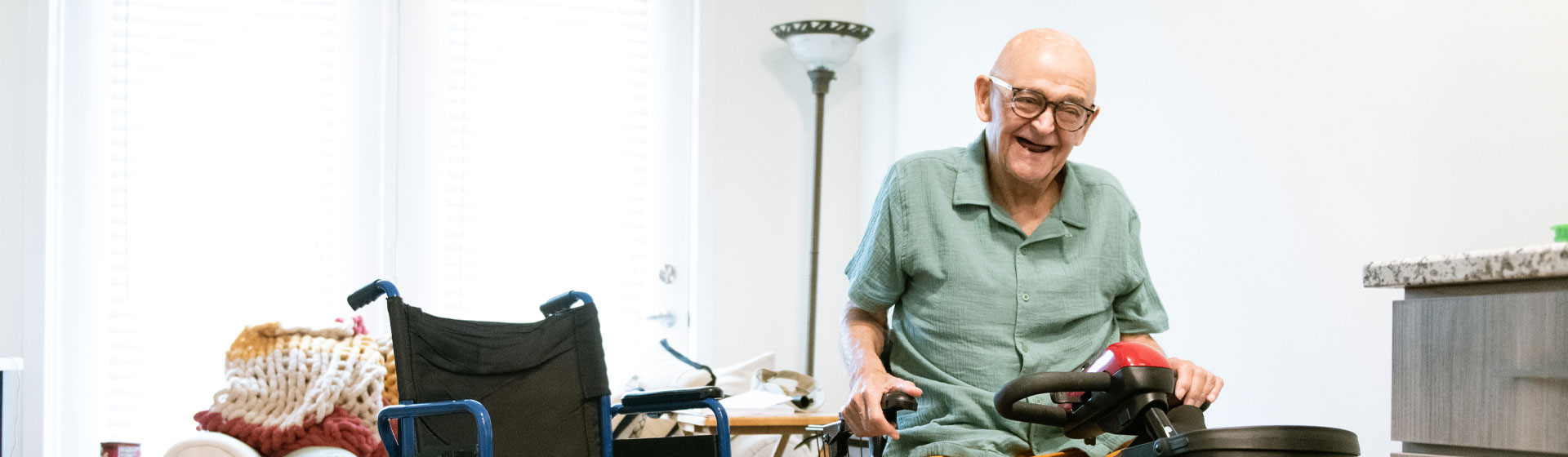 Elderly man on a motorized scoter
