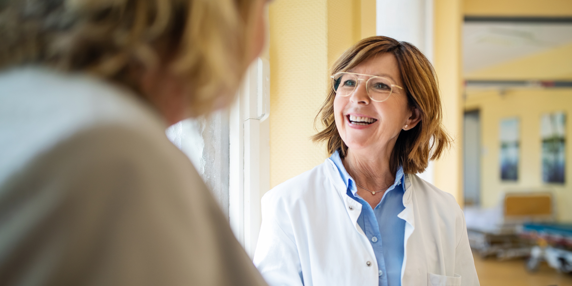 Female Doctor with Patient