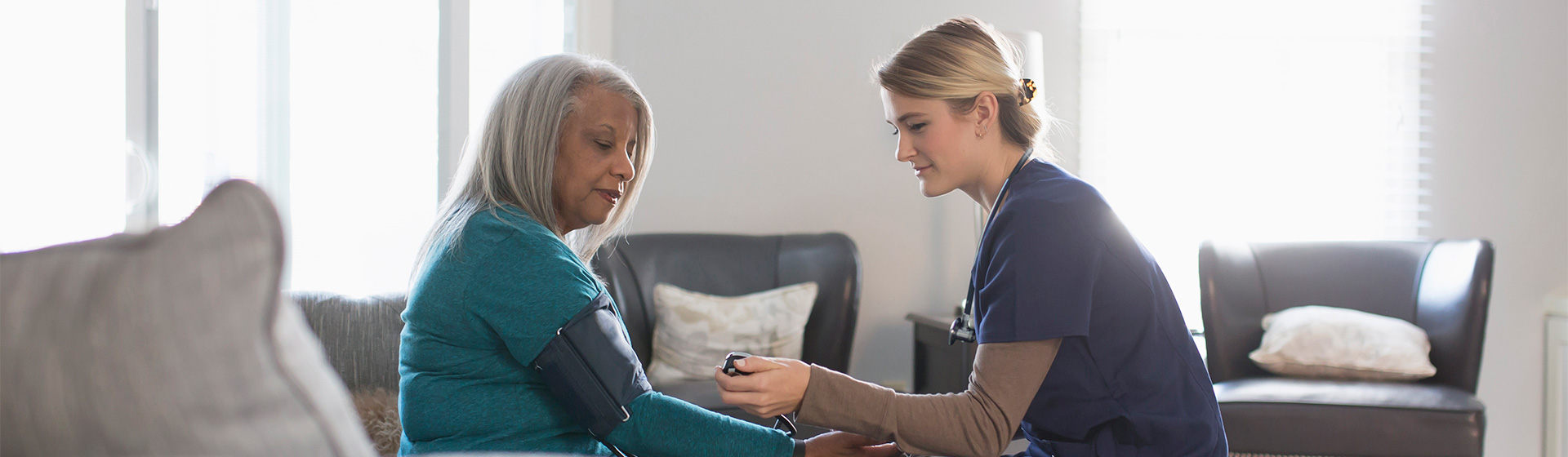 Nurse cares for patient in their home