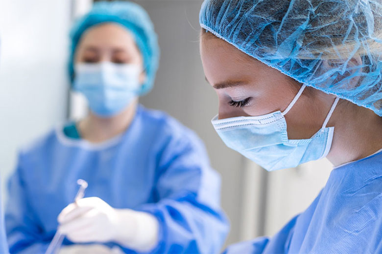 Two surgeons working