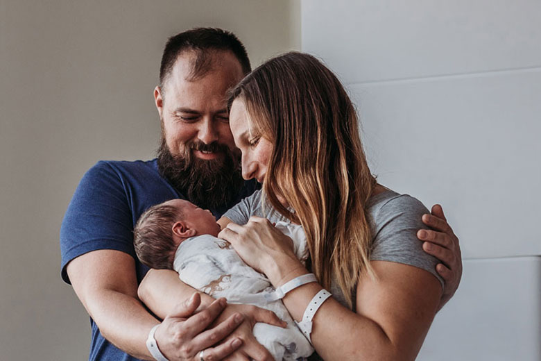 Mother and Father with Newborn Baby